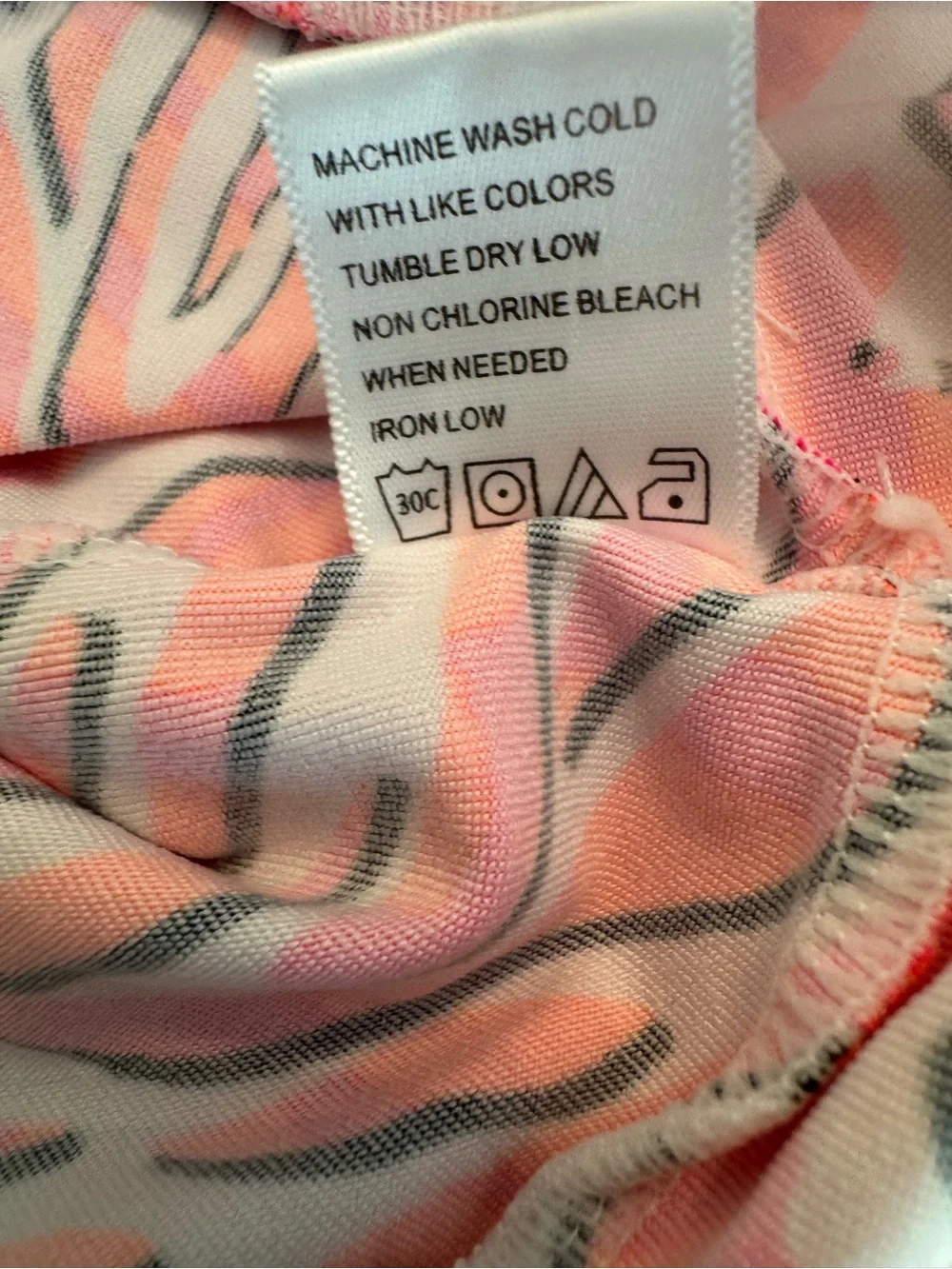 The Tail Activewear Gaia Zebra Swirl Pleated 18